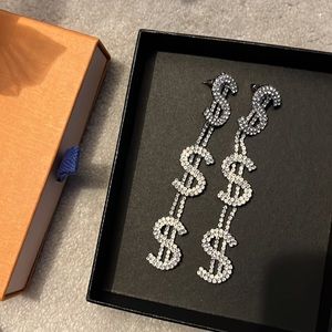 shiny dollar earrings